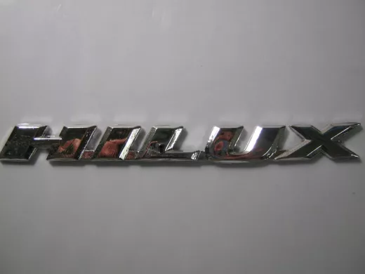 Эмблемма пластик в блистере надпись HILUX с наклоном хром 16x1,5 см